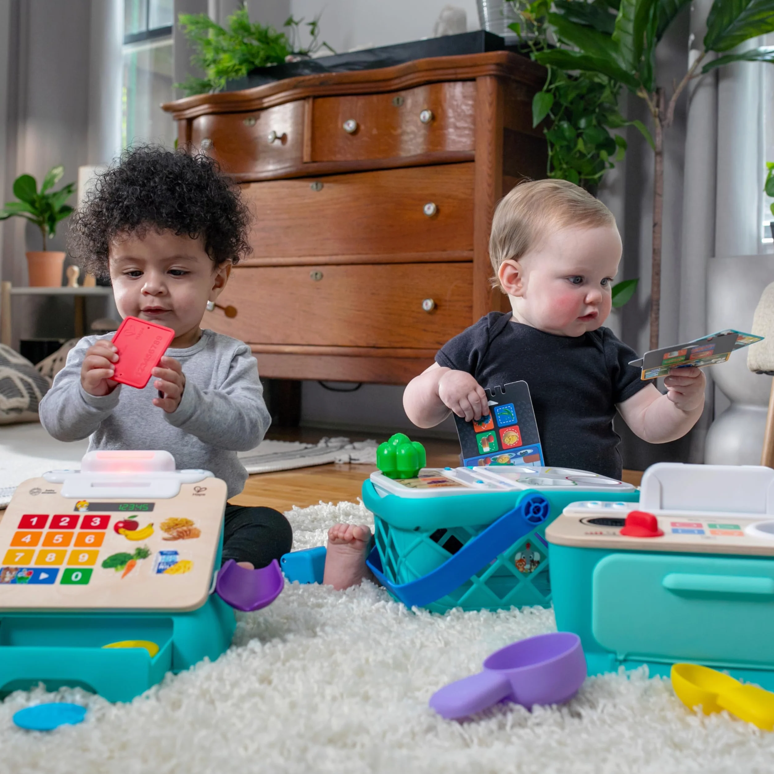 Baby Einstein + Hape Magic Touch Cash Register Pretend to Check Out Toy, z prawdziwymi dźwiękami i muzyką, dla dzieci w wieku od 9 miesięcy