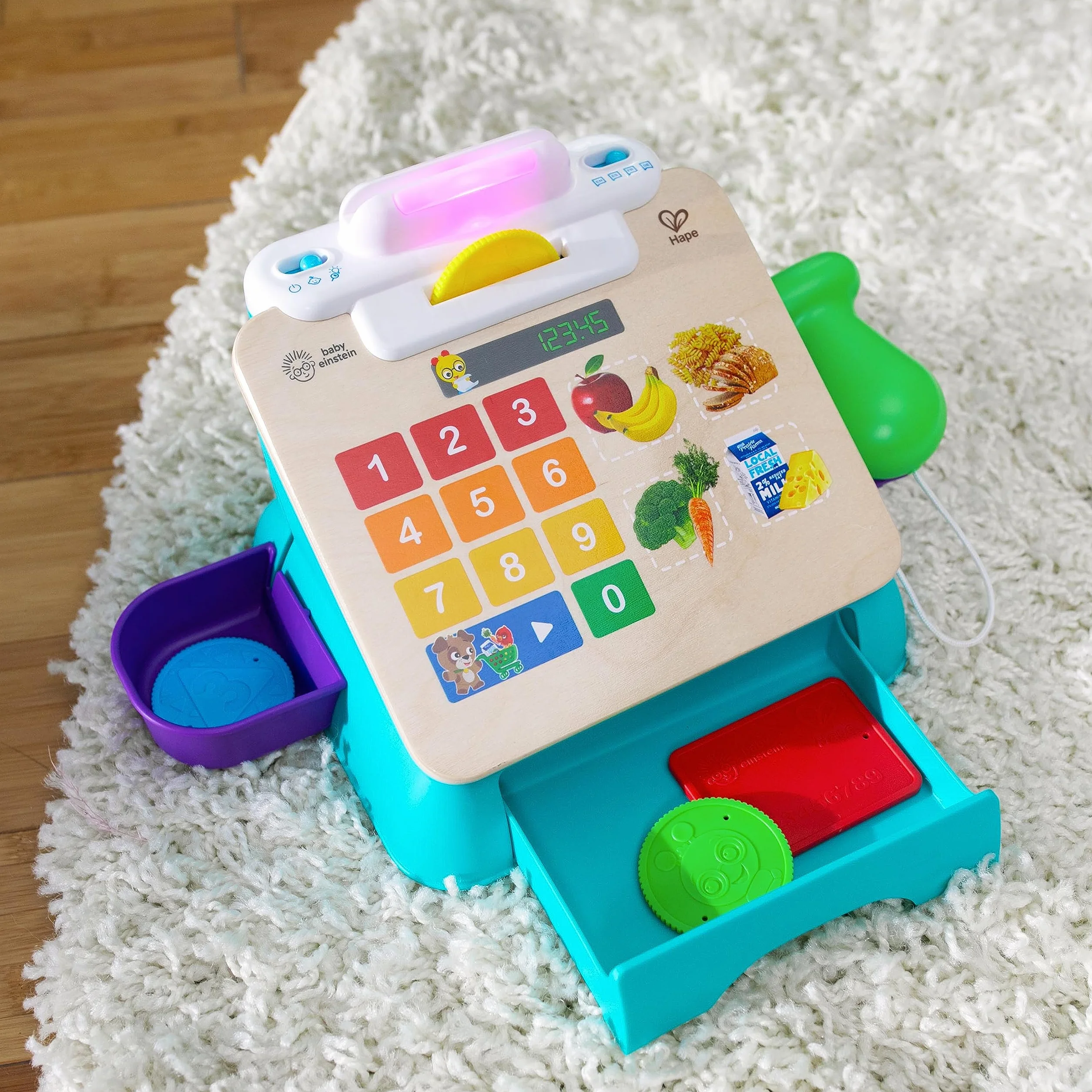 Baby Einstein + Hape Magic Touch Cash Register Pretend to Check Out Toy, z prawdziwymi dźwiękami i muzyką, dla dzieci w wieku od 9 miesięcy