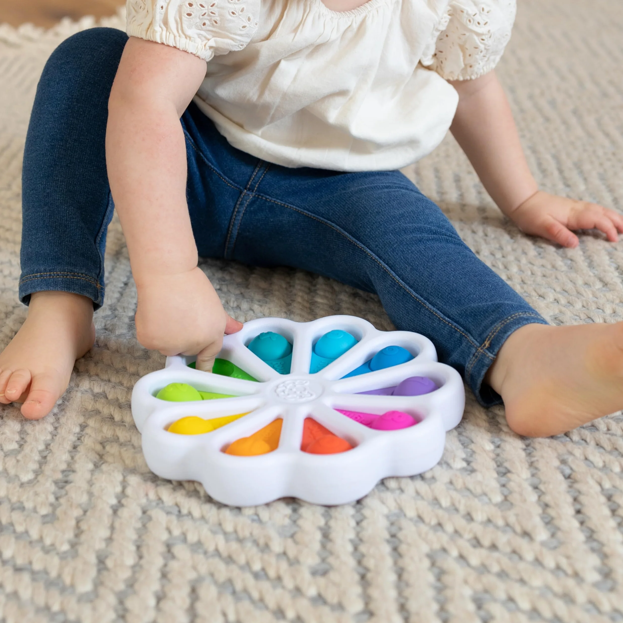 Fat Brain Toys Cyfry Dimpl zabawka edukacyjna sensoryczna dla niemowląt od 2 lat wielokolorowa