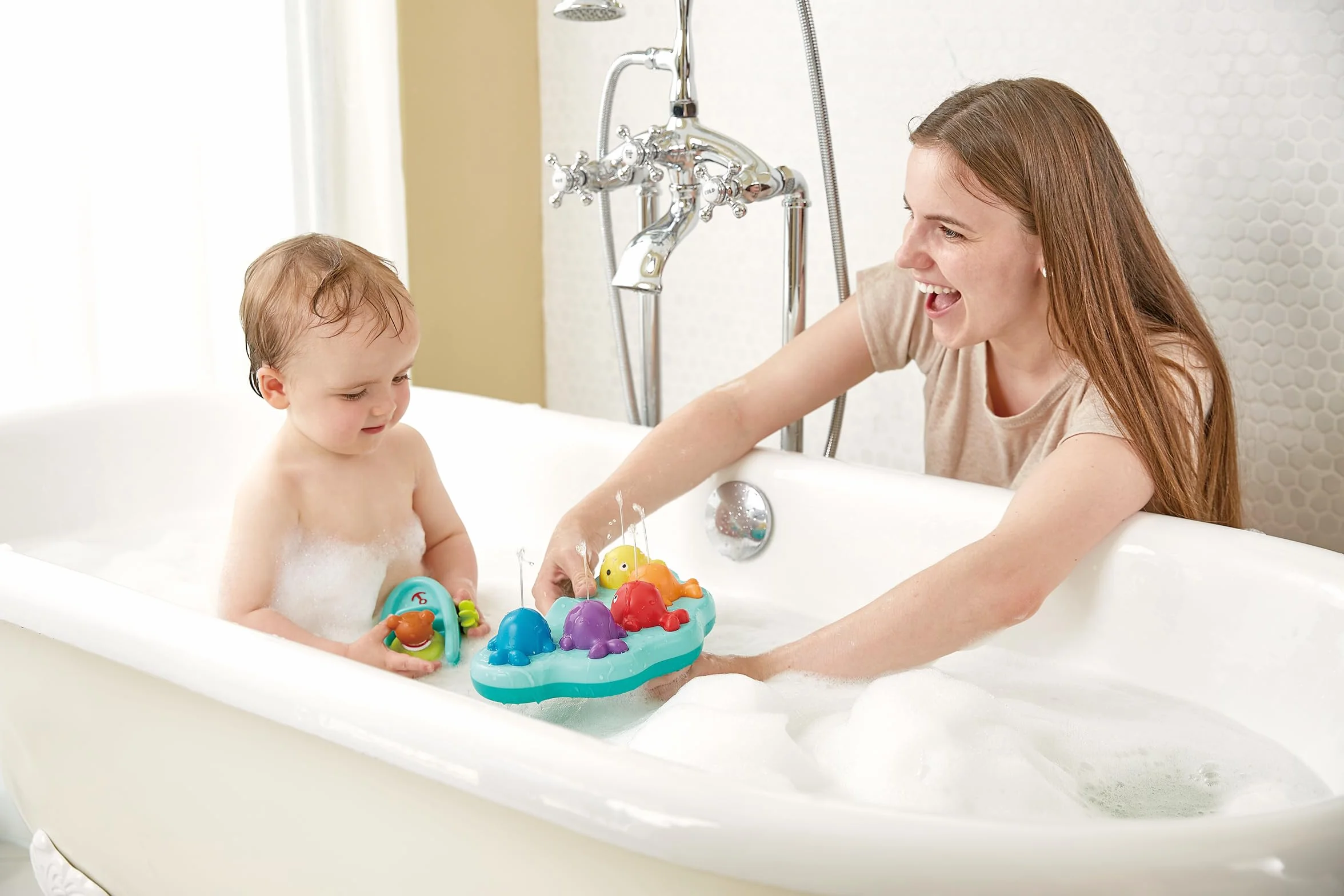 Hape Musical Whale Fountain Bath Toy, Multicolor