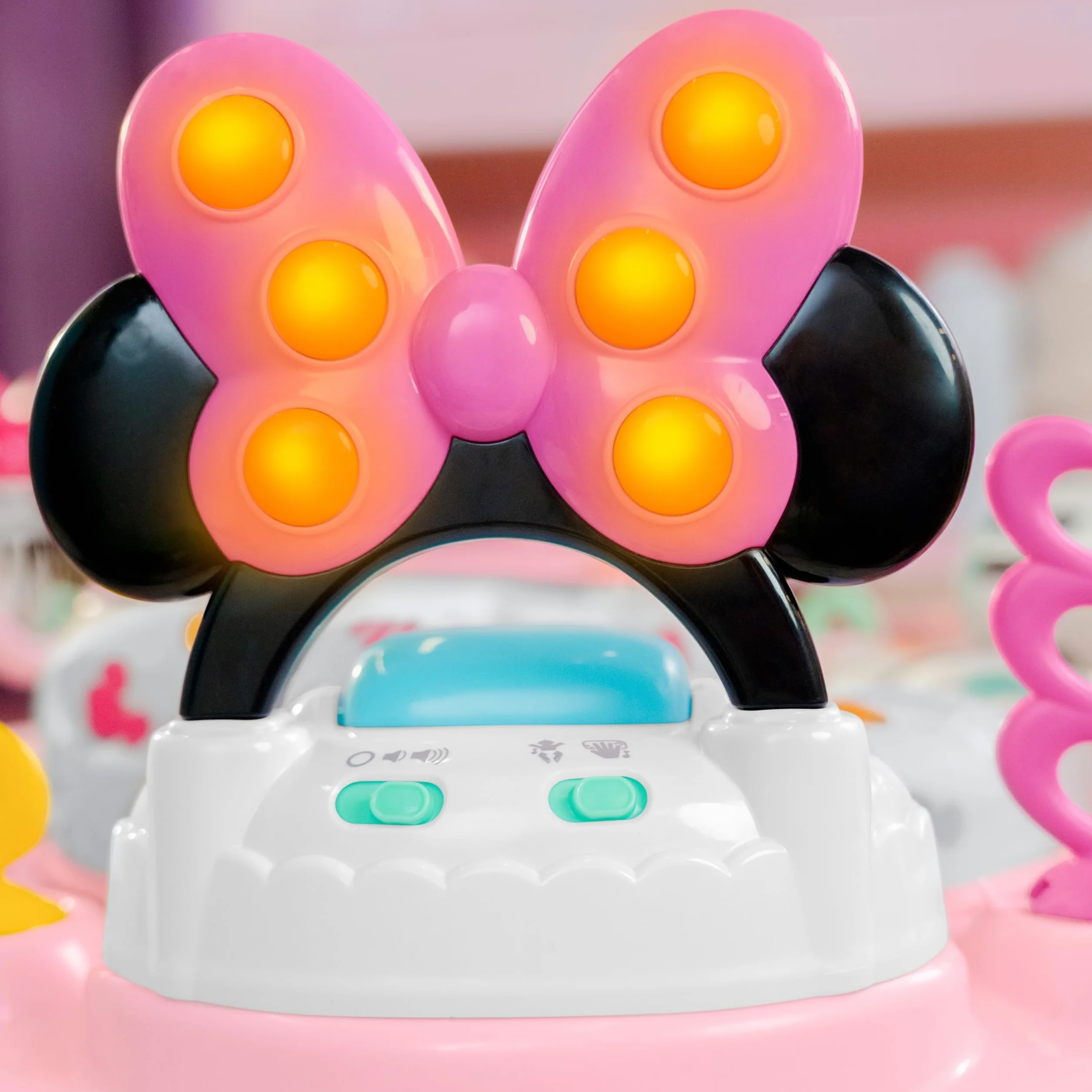 Bright Starts, Disney Baby, Minnie Mouse Forever Bestie, Skoczek i atrakcje - z lampkami i piosenkami, dzieci od 6 miesięcy +
