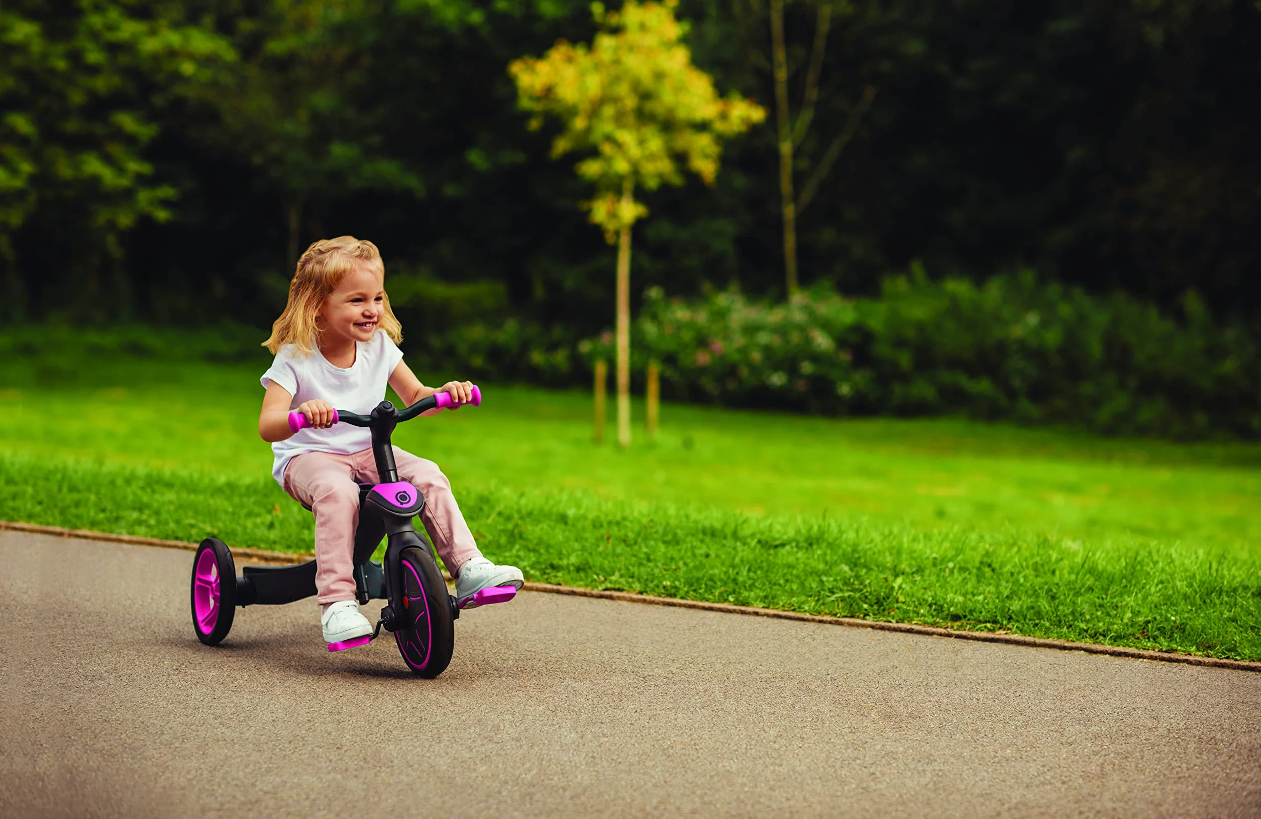 Globber Explorer Trike 4w1 rowerek trójkołowy - biegowy - wózek/Fuchsia 632-110-3 różowy