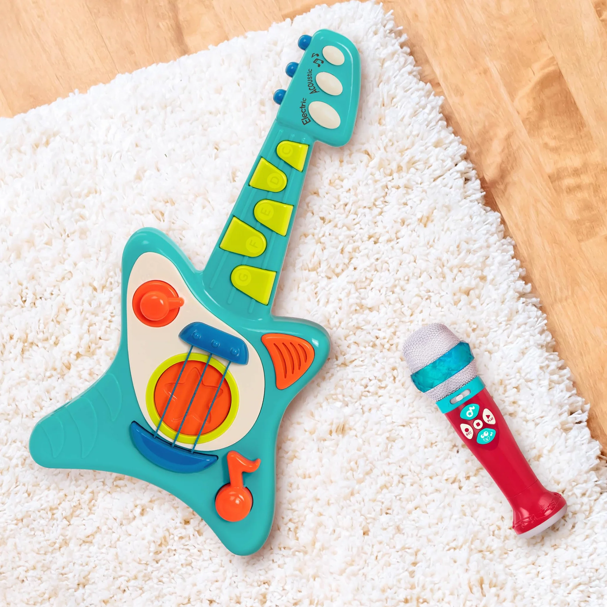 Battat Zabawkowa gitara dla małych dzieci, dzieci – gra na gitarze ze śpiewnikiem – tryby akustyczne, elektryczne i śpiewające – gitara Lil' Rocker's Guitar – 2 lata +