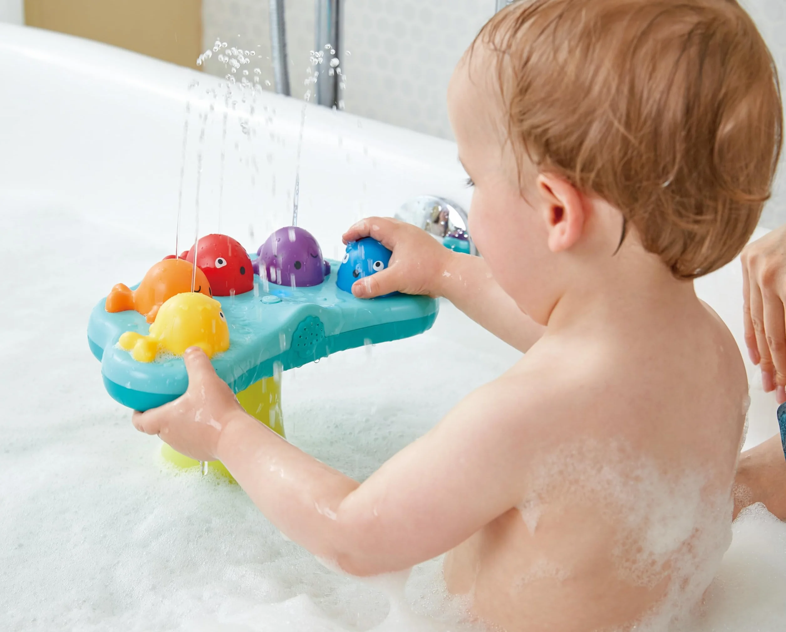Hape Musical Whale Fountain Bath Toy, Multicolor