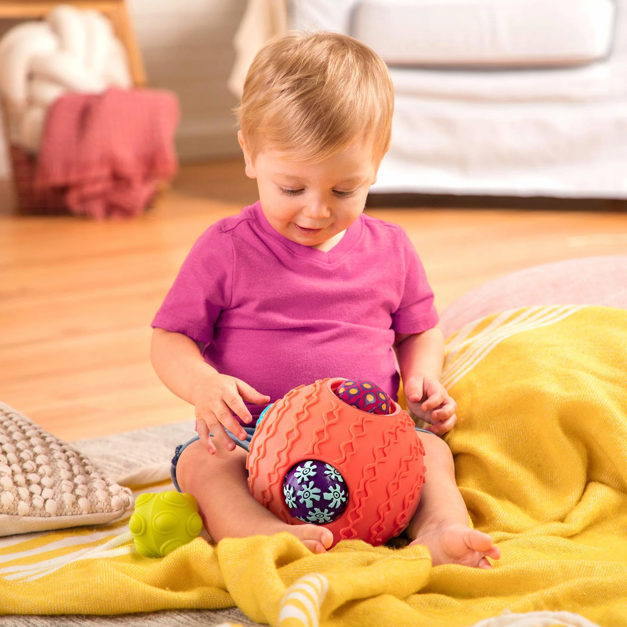 B. Zabawki Ballyhoo Baby Ball ? 1 duża teksturowana piłka z 5 małymi kulkami sensorycznymi ? Zabawki rozwojowe BPA dla niemowląt od 6 miesięcy +