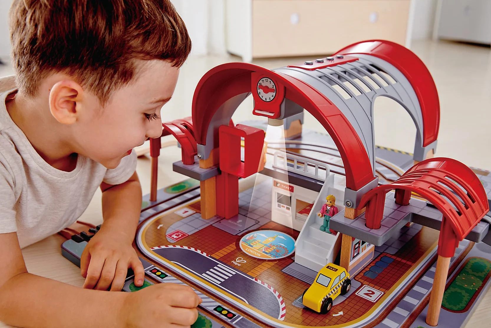 Hape Grand City Station, Wooden Pretend Play Railway Set with Projector and Recorder, For Kids
