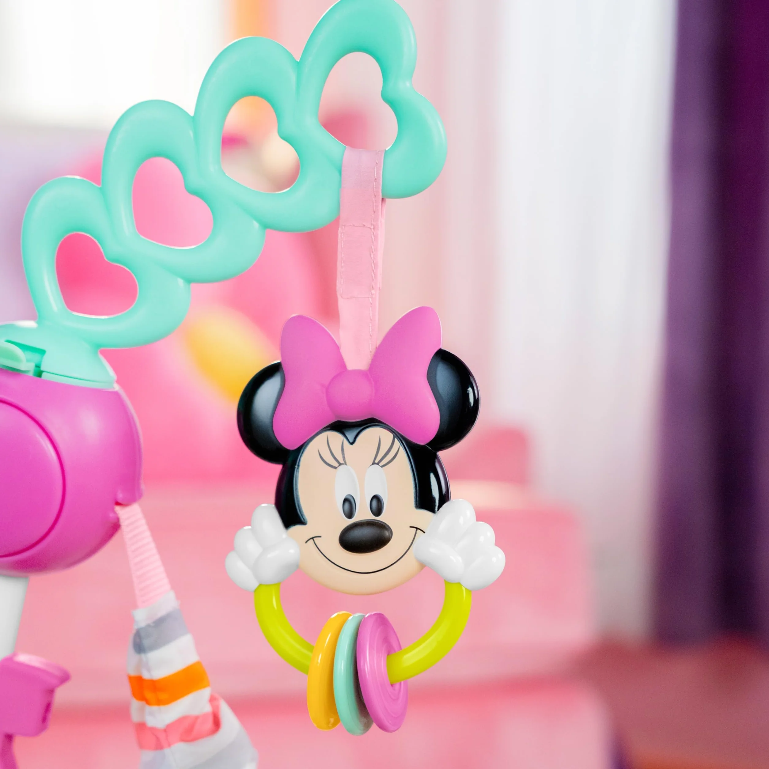 Bright Starts, Disney Baby, Minnie Mouse Forever Bestie, Skoczek i atrakcje - z lampkami i piosenkami, dzieci od 6 miesięcy +