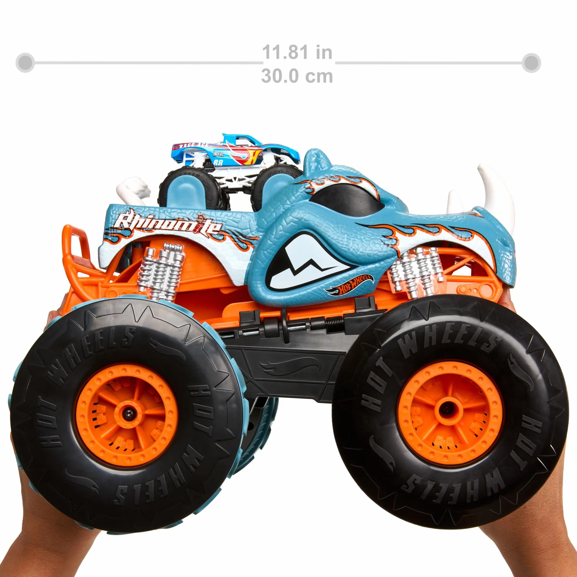 Hot Wheels Monster Trucks R/C Rhinomite Mega Transformacja Pojazd zdalnie sterowany 1:12 + pojazd Race Ace w skali 1:64, transformacja w wyrzutnię, łączy się z pomarańczowym torem, HPK27