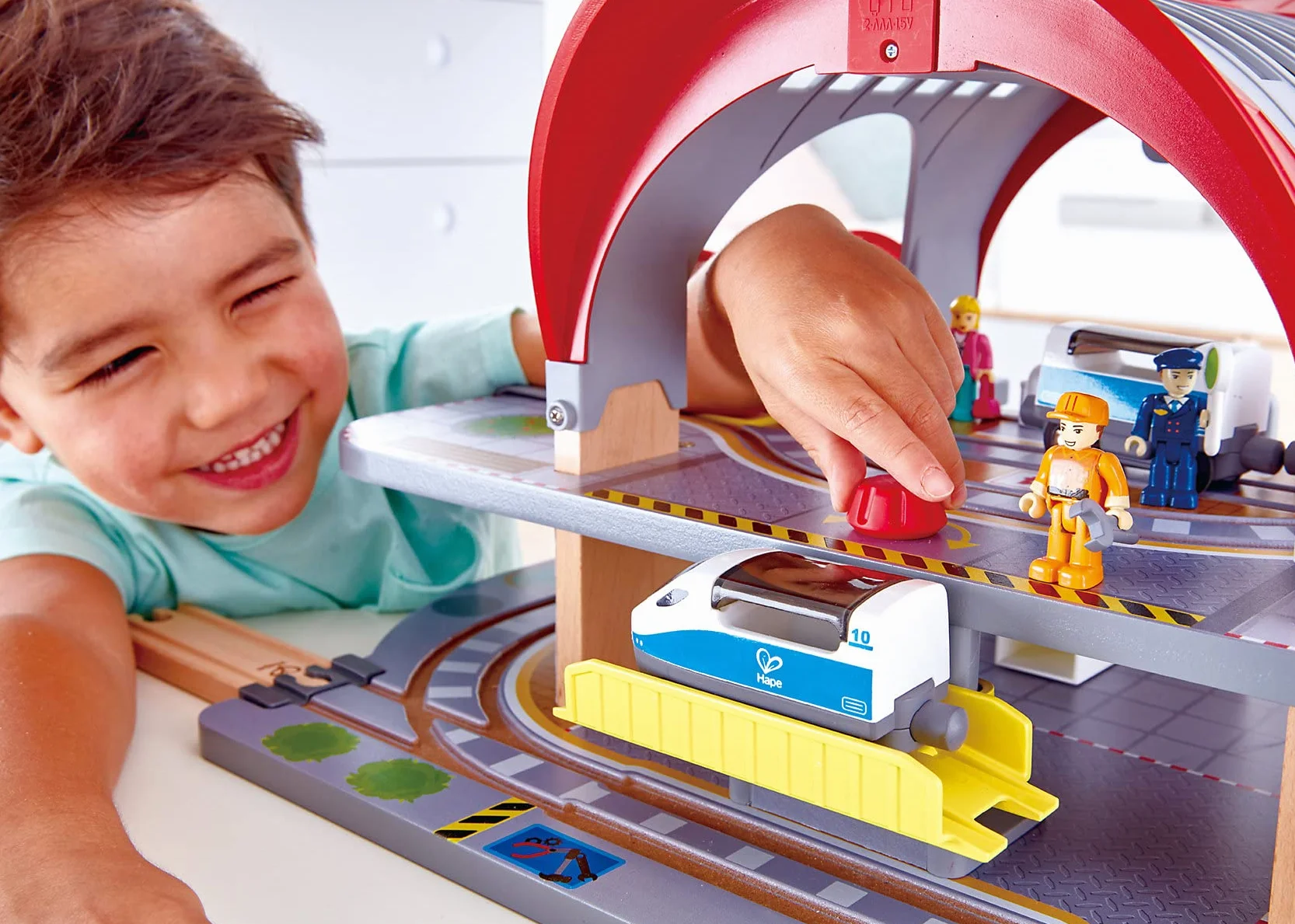 Hape Grand City Station, Wooden Pretend Play Railway Set with Projector and Recorder, For Kids