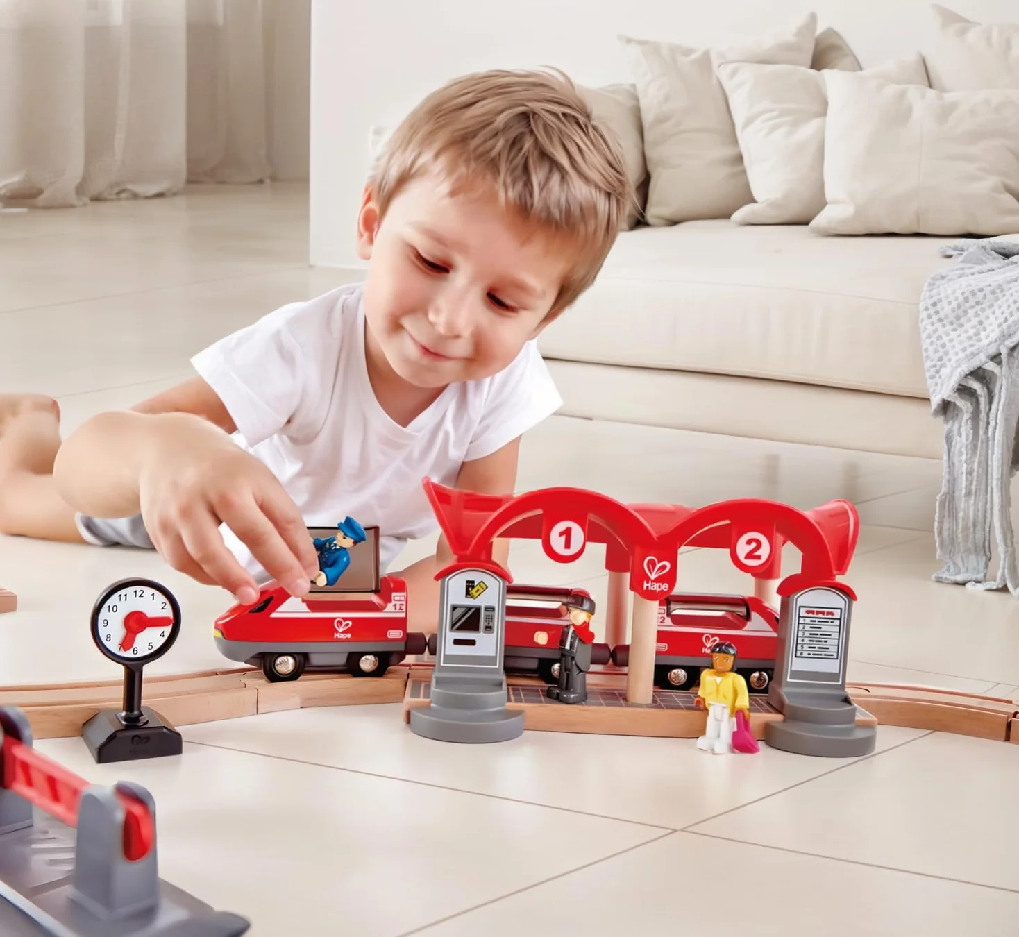 Hape Busy City Train Rail Set, Complete City-Themed Wooden Rail Toy Set for Toddlers with Passenger Train, Freight Train, Station, Play Figurines and More