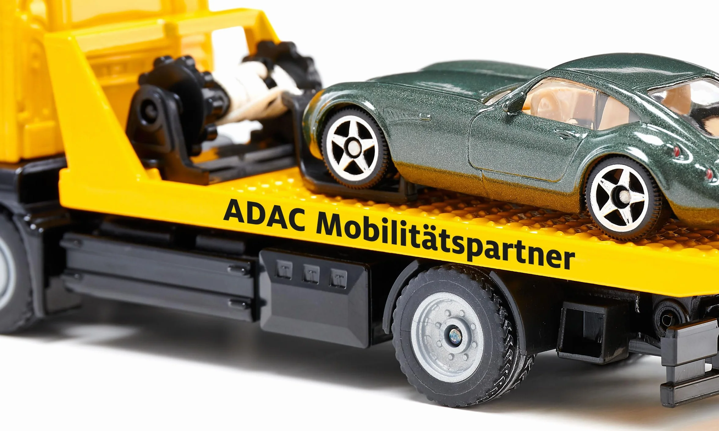 siku 2722, MAN Holownik ADAC, W komplecie zabawkowy samochód do odholowania, 1:55, Metal/Tworzywo sztuczne, Żółty, Wyciągana wciągarka, Wychylana i opuszczana platforma transportowa