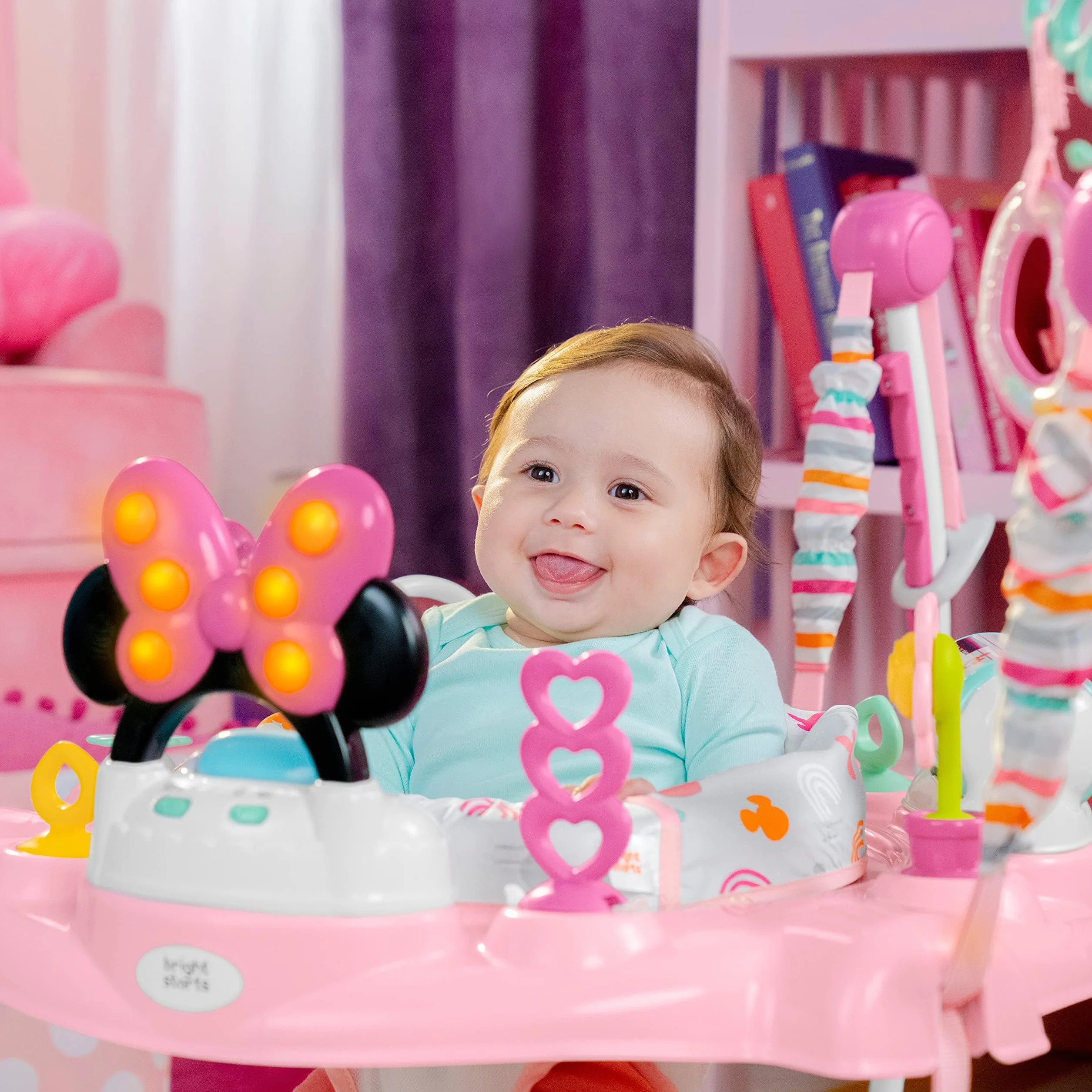 Bright Starts, Disney Baby, Minnie Mouse Forever Bestie, Skoczek i atrakcje - z lampkami i piosenkami, dzieci od 6 miesięcy +