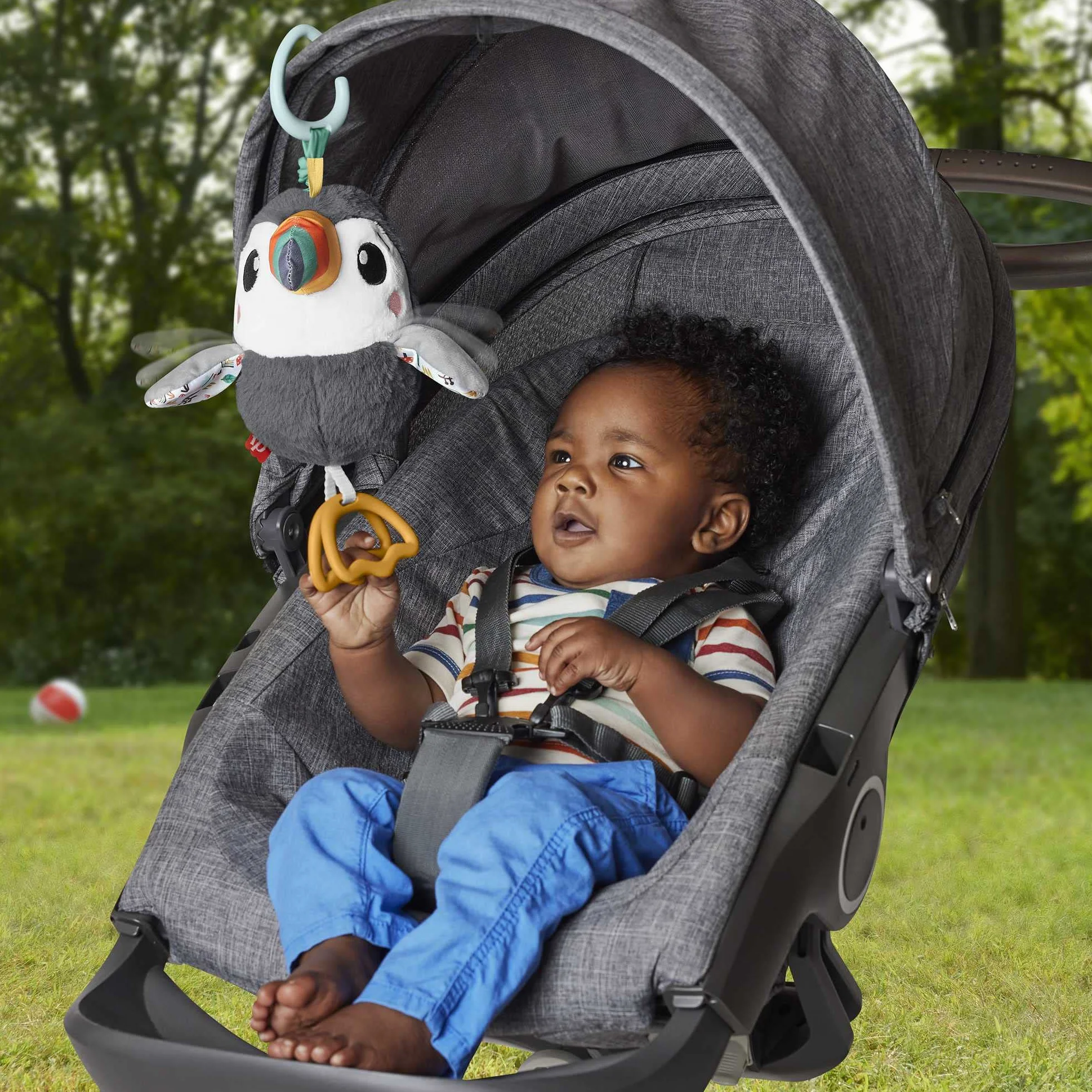 Fisher-Price Trzepoczący Tukan Zawieszka Zabawka sensoryczna do wózka HNX66