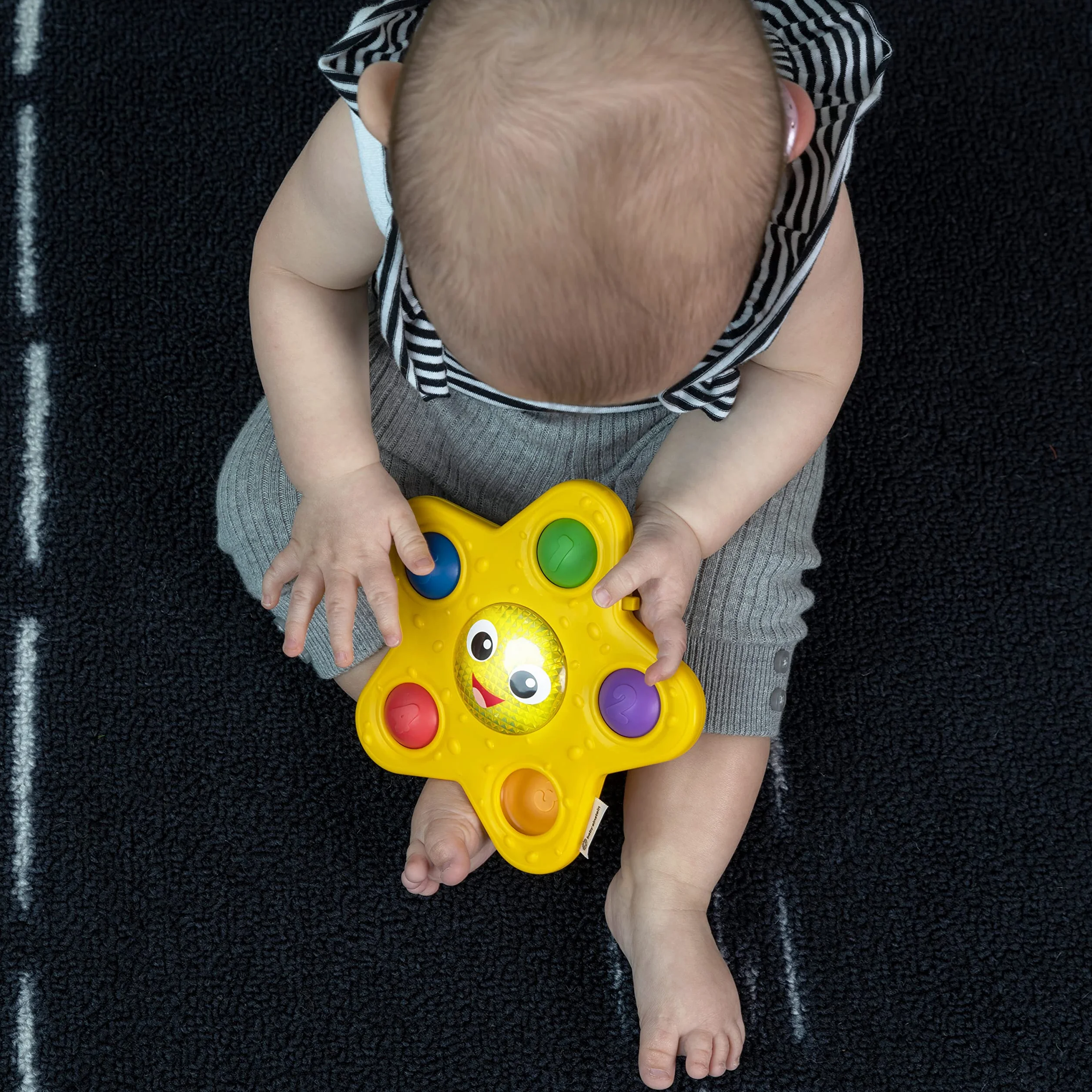 Baby Einstein Ocean Explorers Pop & Glow Starfish Light Up sensoryczna zabawka dla dzieci od 6 miesięcy
