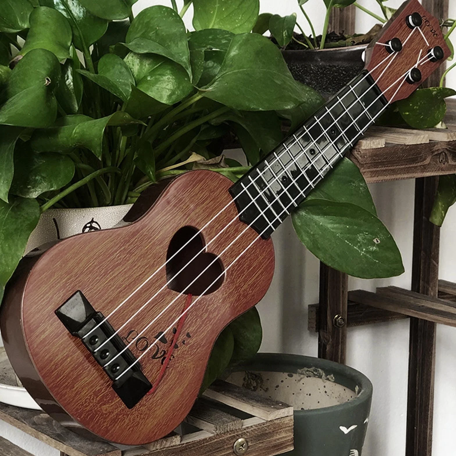 Sxhlseller Miniaturowa Grywalna Plastikowa Zabawka Ukulele dla Dzieci i Początkujących, Instrument Muzyczny do Wczesnej Edukacji dla Dzieci, Lekki i Wytrzymały Mały Ukulele dla Przedszkolaków