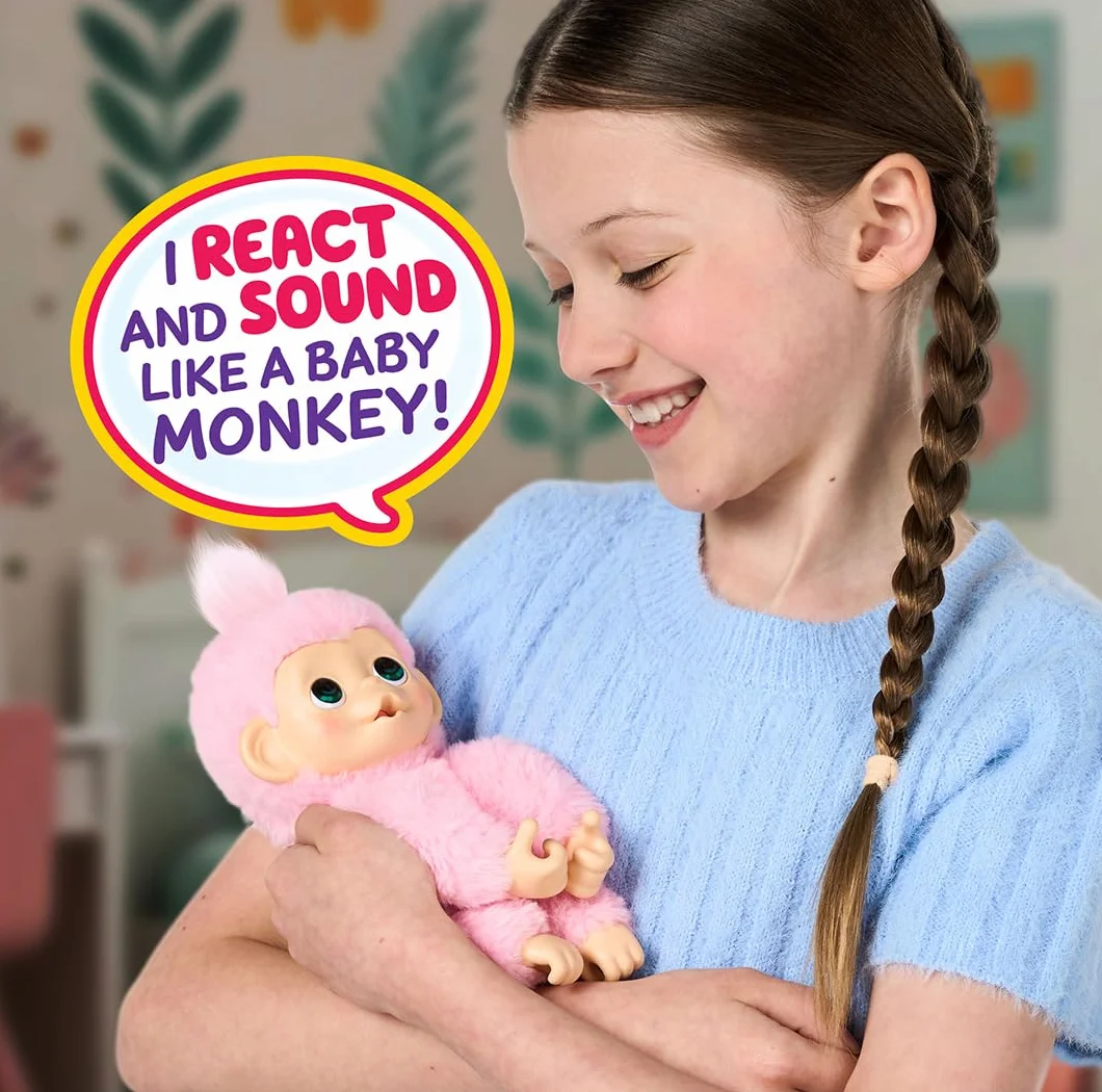 Little Live Pets Baby Monkey Minis – Luna Lemon. Interaktywna zabawka dla zwierząt domowych. Ponad 20 dźwięków i reakcji. Miękkie różowe futro. 18,8 cm wysokości. Karmić, pielęgnować. Reaguj