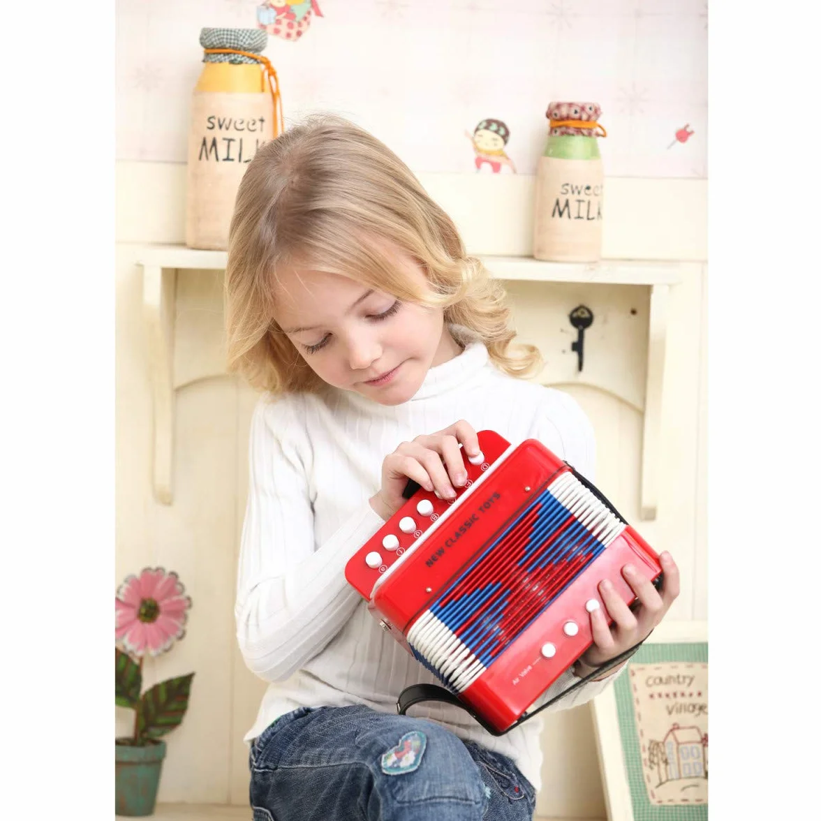 New Classic Toys akordeon z książką muzyczną niebieski 10056