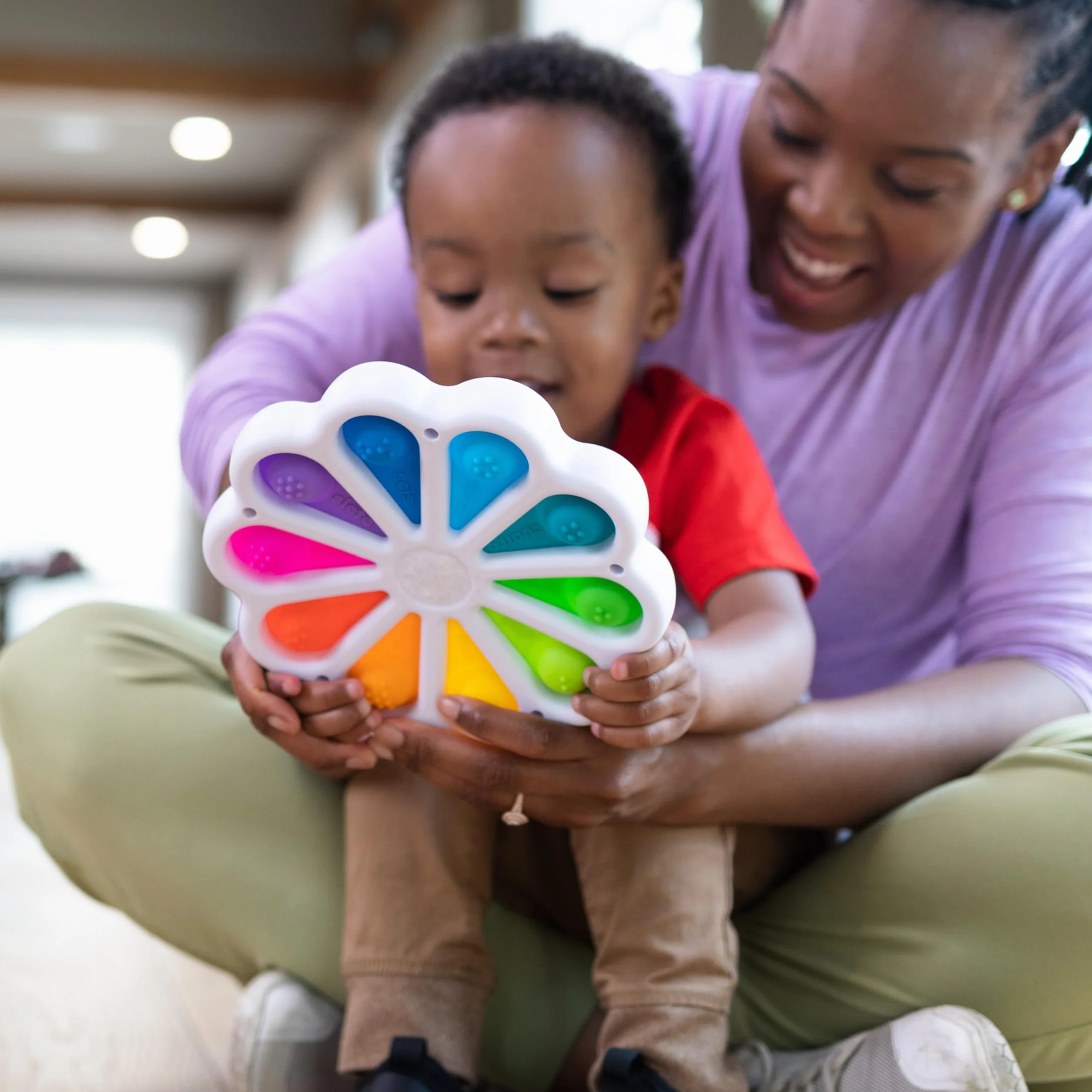 Fat Brain Toys Cyfry Dimpl zabawka edukacyjna sensoryczna dla niemowląt od 2 lat wielokolorowa