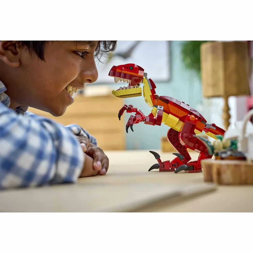 LEGO Creator 3 w 1 Groźny dinozaur, trzy opcje budowania: welociraptor, stegozaur lub pterozaur, zabawka konstrukcyjna dla chłopca i dziewczynki, prezent dla dzieci w wieku od 8 lat 31379