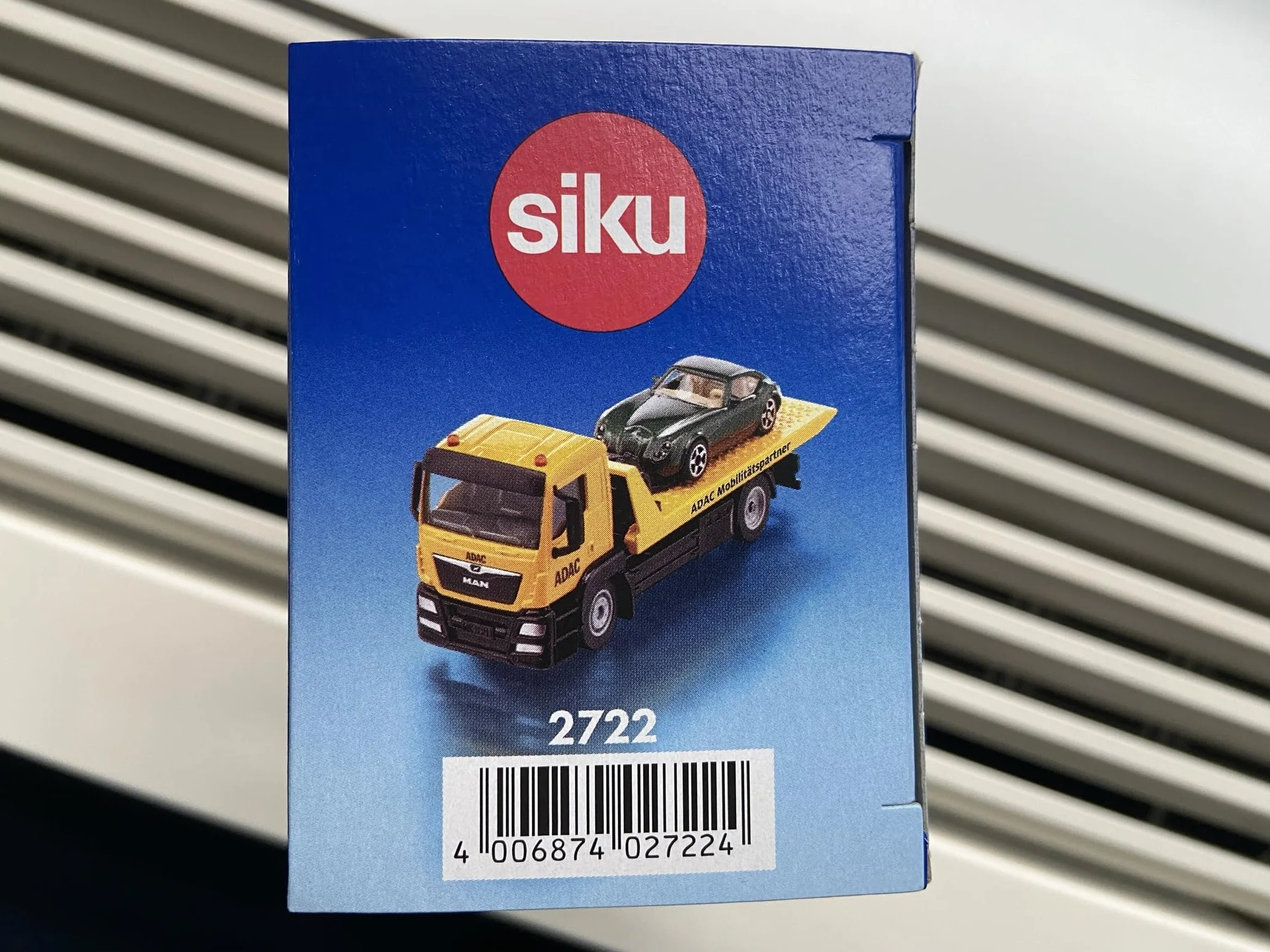 siku 2722, MAN Holownik ADAC, W komplecie zabawkowy samochód do odholowania, 1:55, Metal/Tworzywo sztuczne, Żółty, Wyciągana wciągarka, Wychylana i opuszczana platforma transportowa