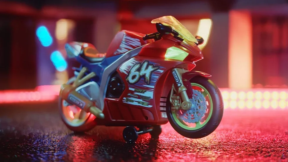 Nikko 20031 Road Rippers Wheelie motocykl wyścigowy porusza się po naciśnięciu przycisku, przednie koło unosi się, świecące koła, efekty świetlne i dźwiękowe, łącznie z bateriami, dla dzieci od 3 lat,