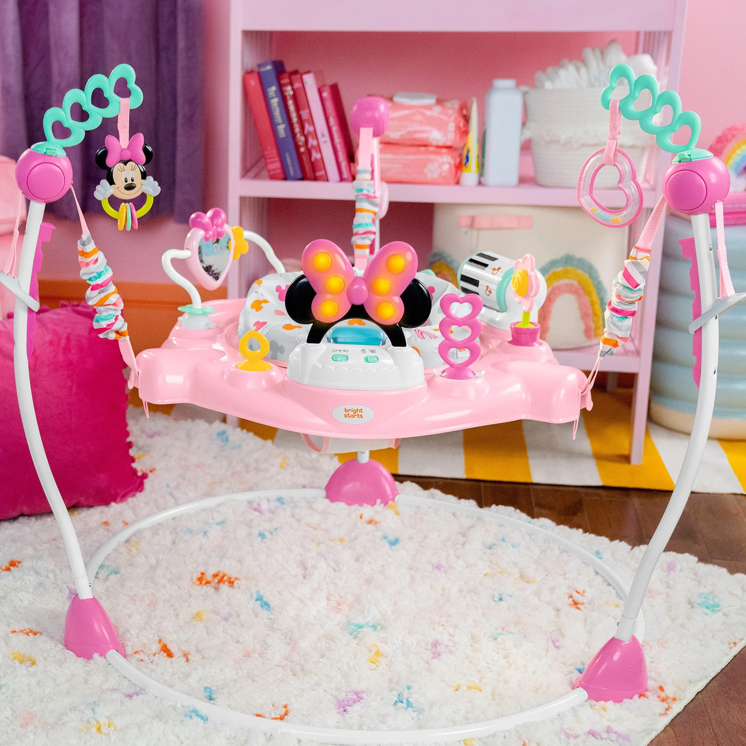 Bright Starts, Disney Baby, Minnie Mouse Forever Bestie, Skoczek i atrakcje - z lampkami i piosenkami, dzieci od 6 miesięcy +