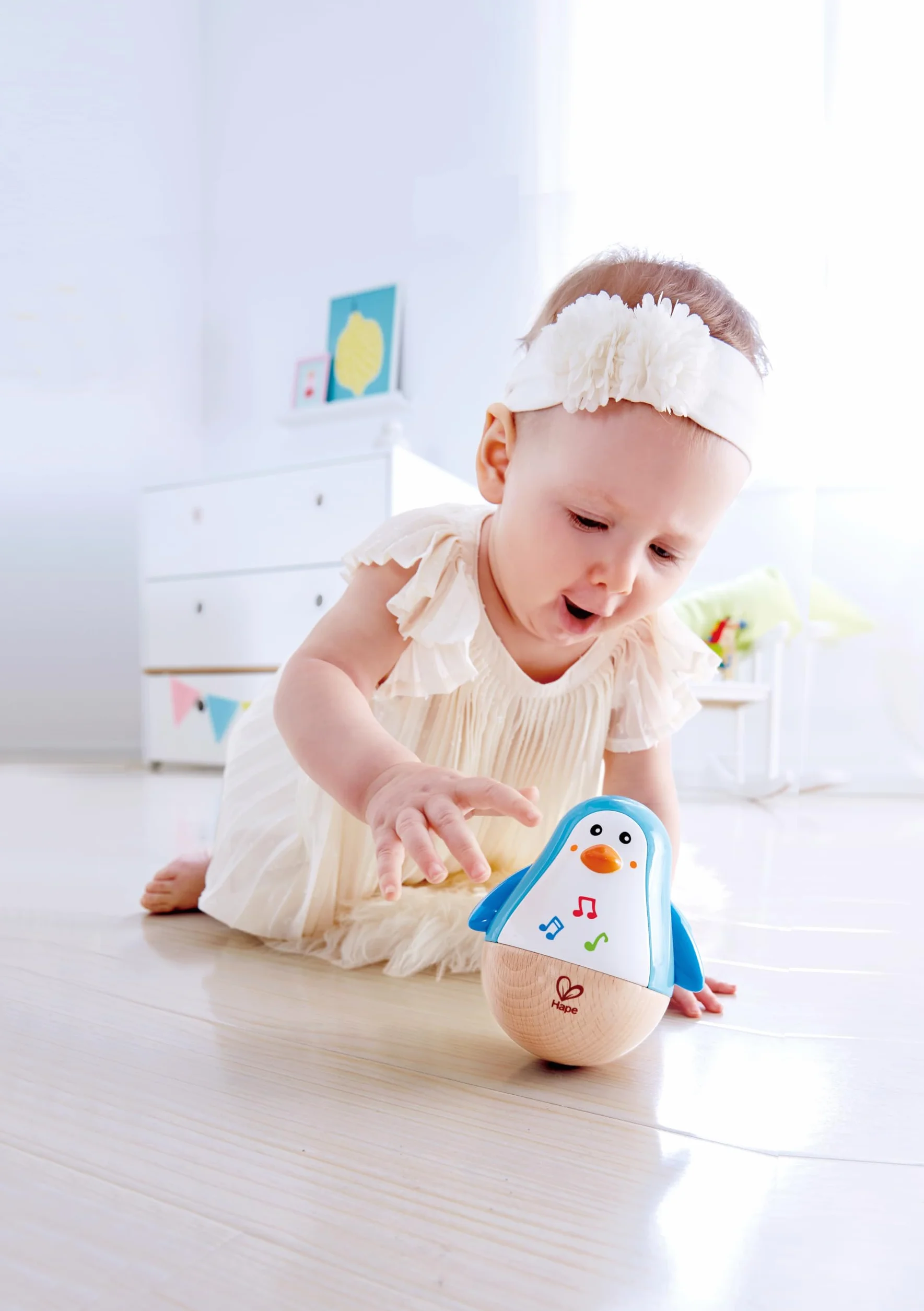 Hape Penguin Musical Wobbler, Colourful Wobbling Melody, Roly-Poly Toy for Kids 6 Months+